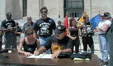 Commander signs NO HELMET Legislation enabling increasing opportunities for organ donation